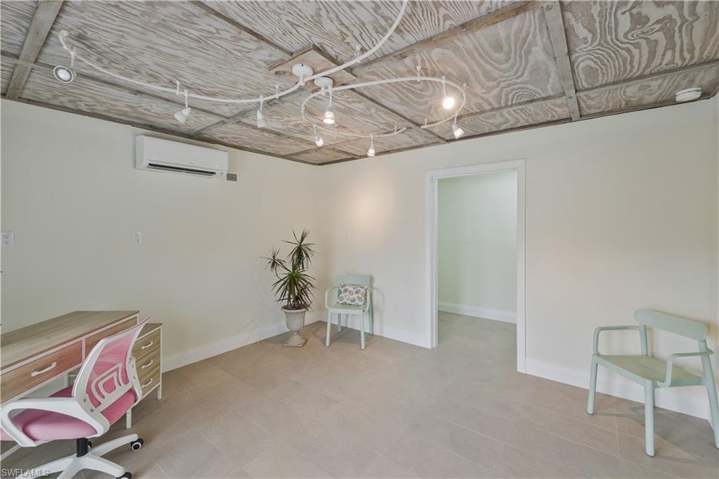 Home office with a mini split for heating / cooling and baseboards
