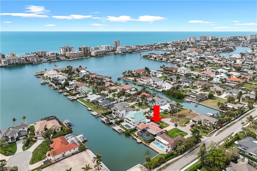 View of urban area featuring a large body of water and nearby suburban area