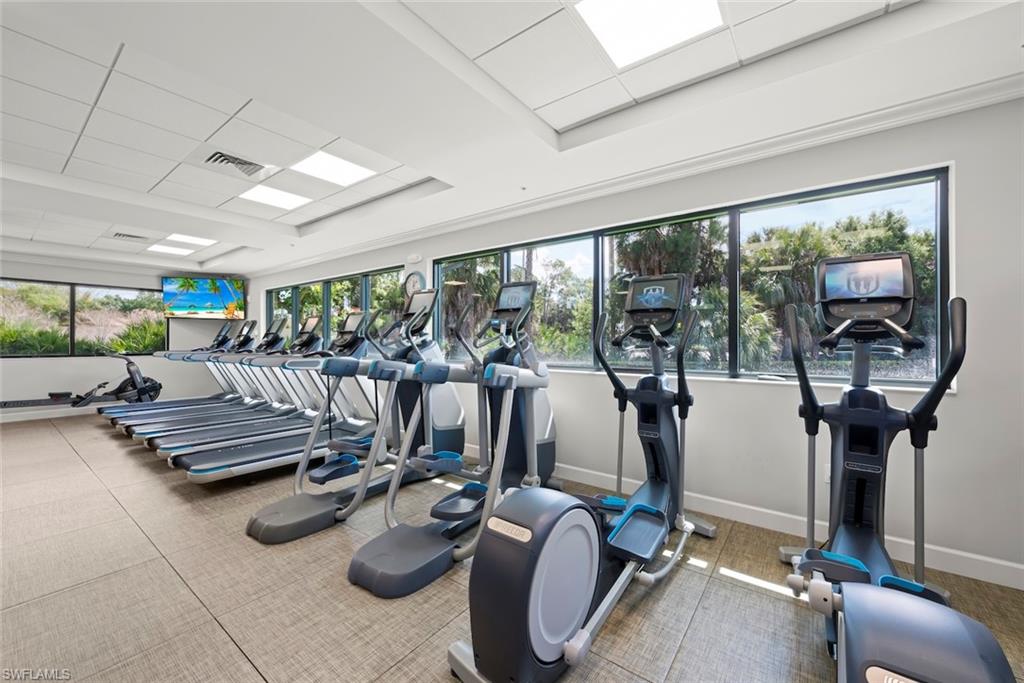 Exercise room with a paneled ceiling