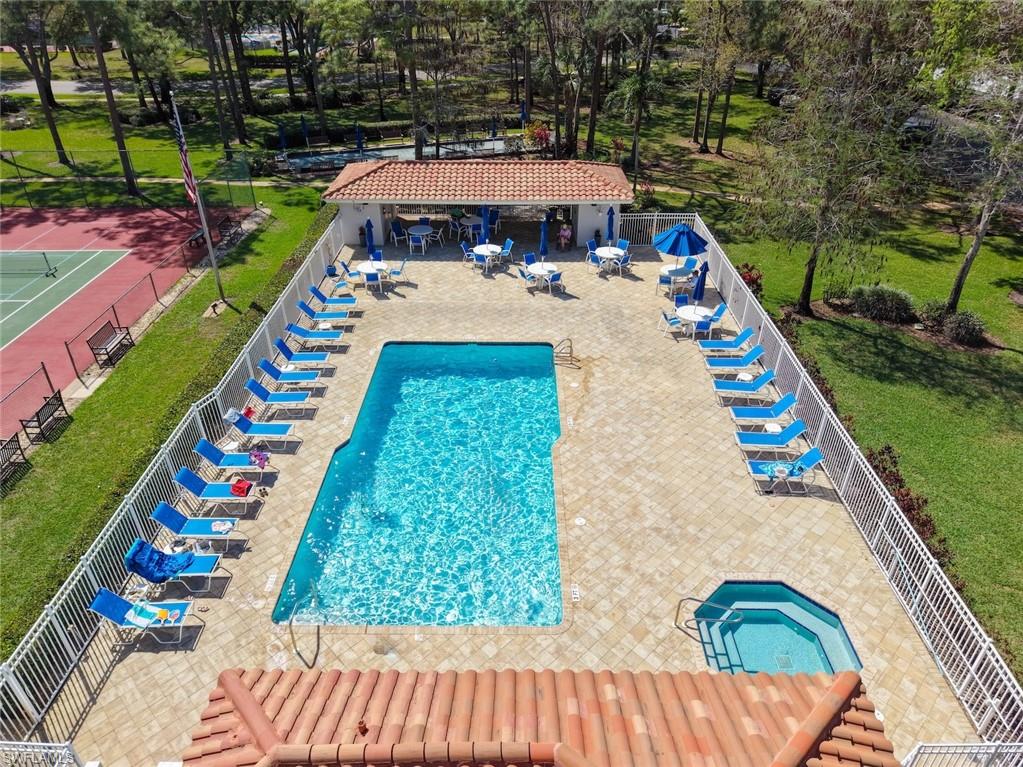 Community pool featuring a patio