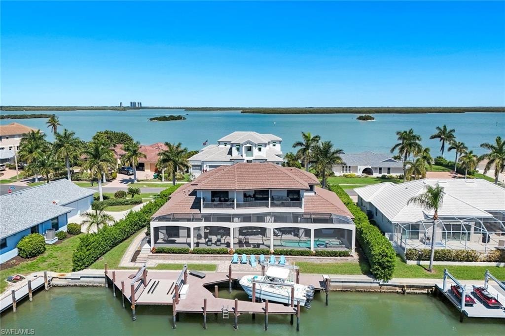 Aerial view of residential area with a large body of water