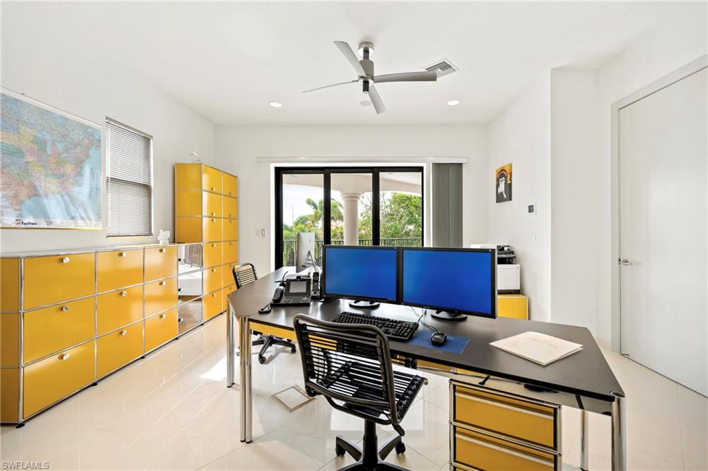 Office featuring a ceiling fan and recessed lighting and access to huge balcony with canal and water view