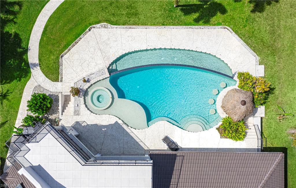 Drone / aerial view of a pool area