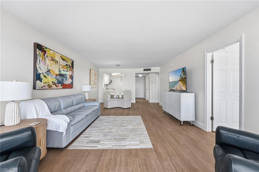 The living area is bright, inviting, and designed to embrace the coastal setting.