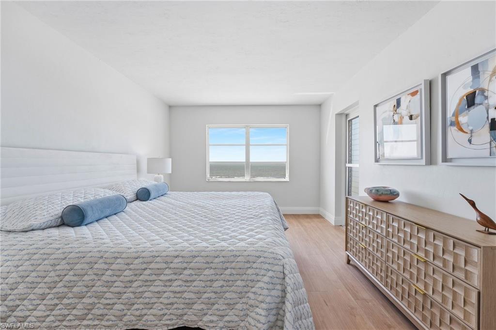 A serene primary suite designed for easy beachside living.