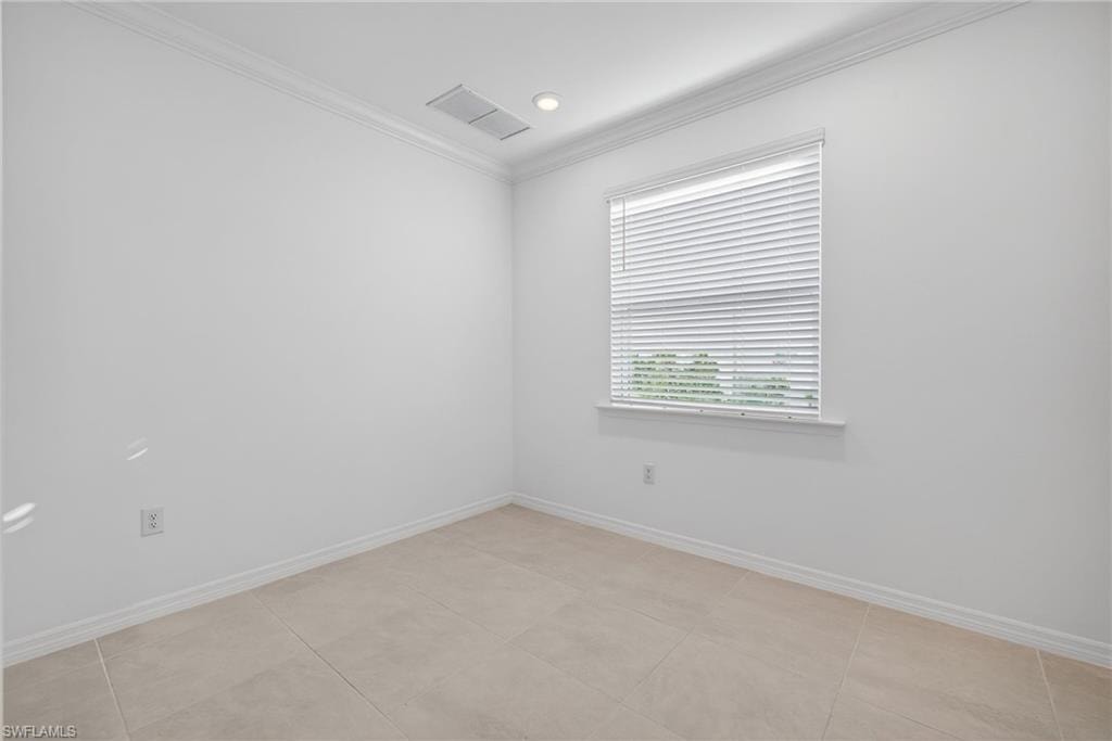 Unfurnished room featuring crown molding and recessed lighting