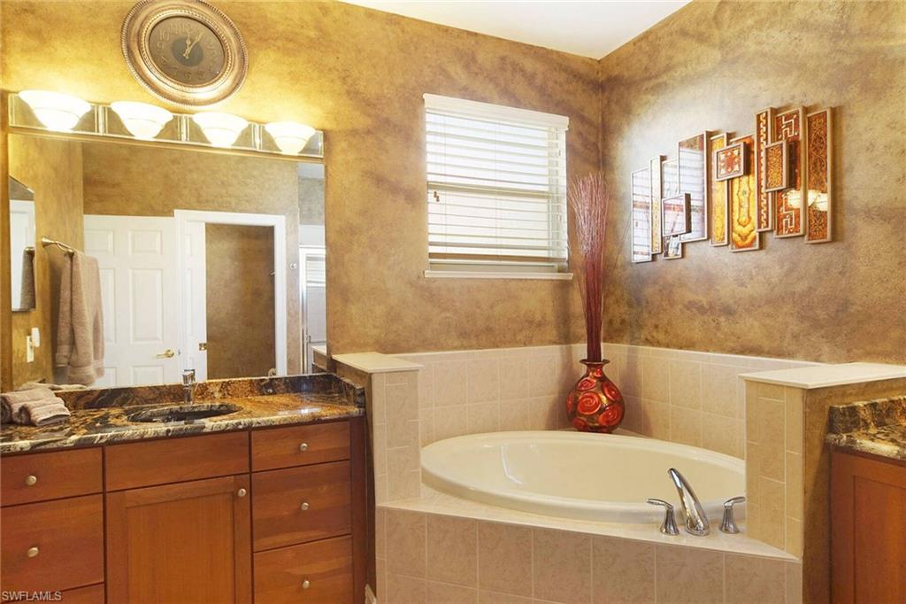 Master Bathroom has soaking tub and mirror