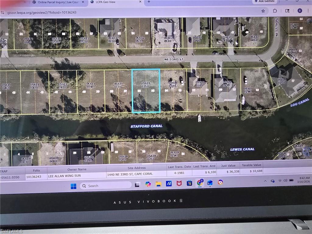 Aerial overview of property's location featuring property boundaries highlighted
