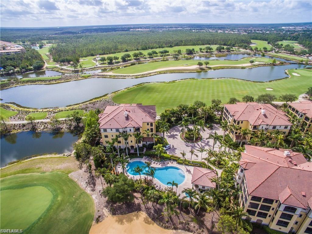 Aerial view of a golf course and a large body of water