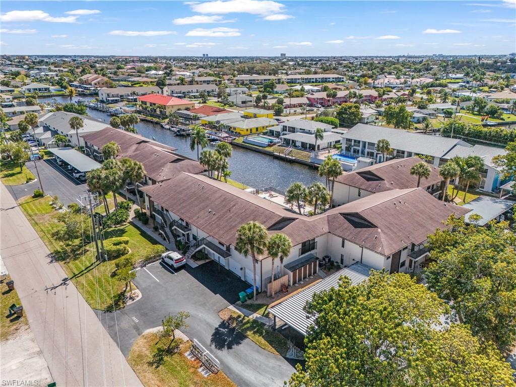 Aerial view of residential area with a nearby body of water