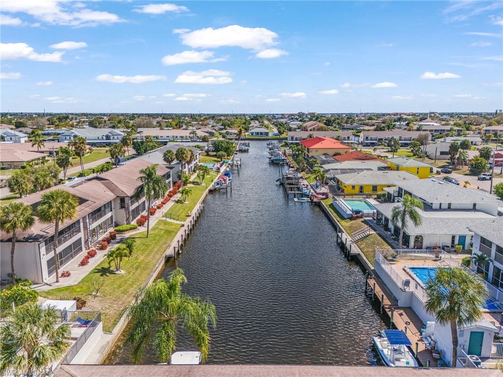 Aerial view of residential area with a nearby body of water