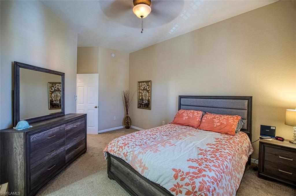 Guest bedroom with attached bath and walk in closet