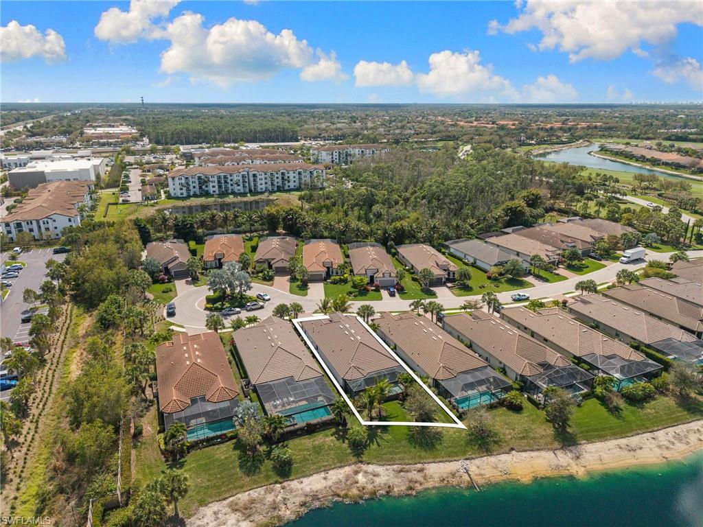 Aerial view of residential area with a nearby body of water