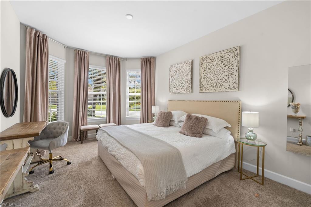 Bedroom featuring carpet