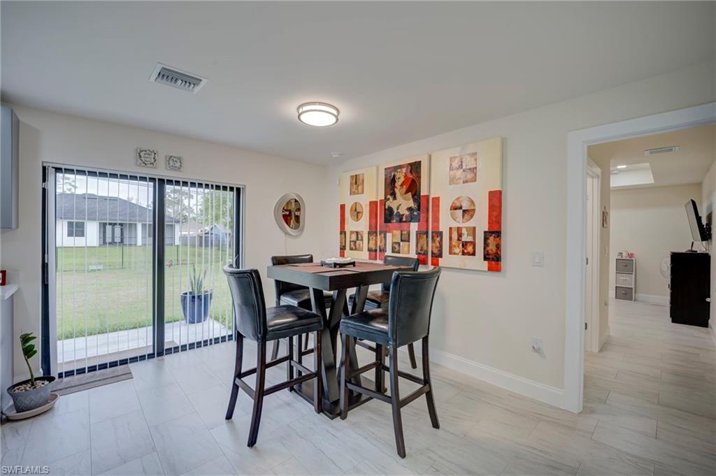 Dining space featuring baseboards