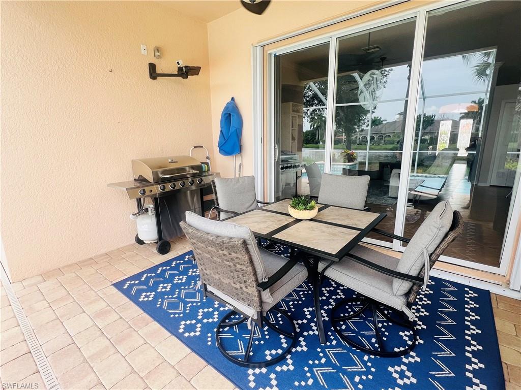 View of patio / terrace featuring a grill