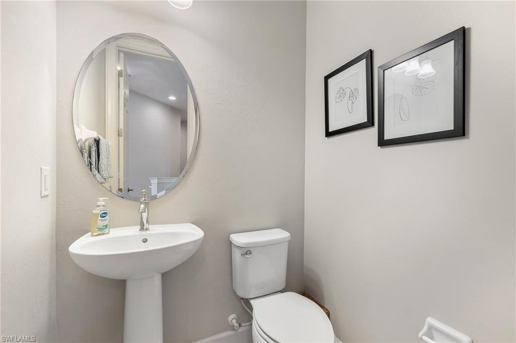 Half bathroom featuring toilet