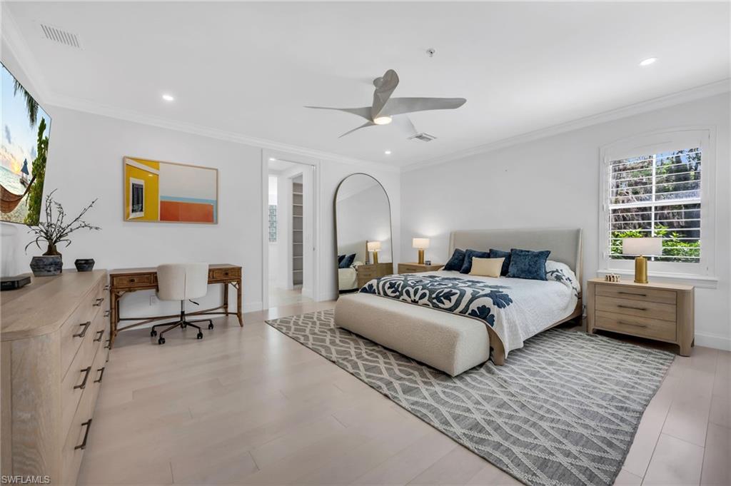 Spacious Primary bedroom with an abundance of natural light