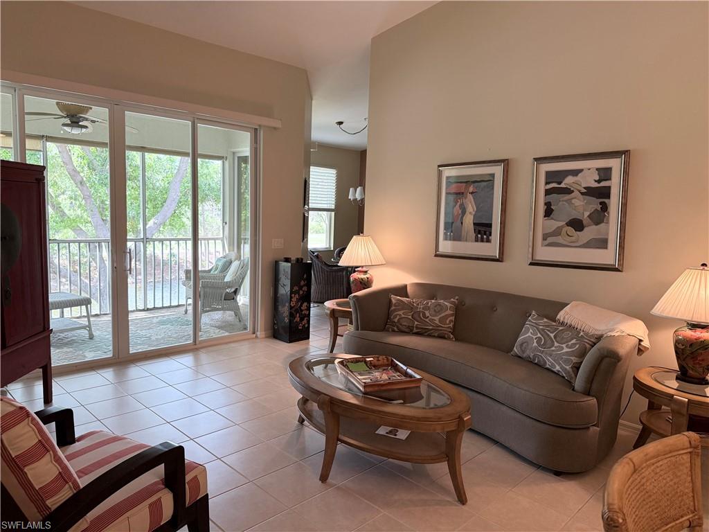 Living area featuring light tile patterned floors