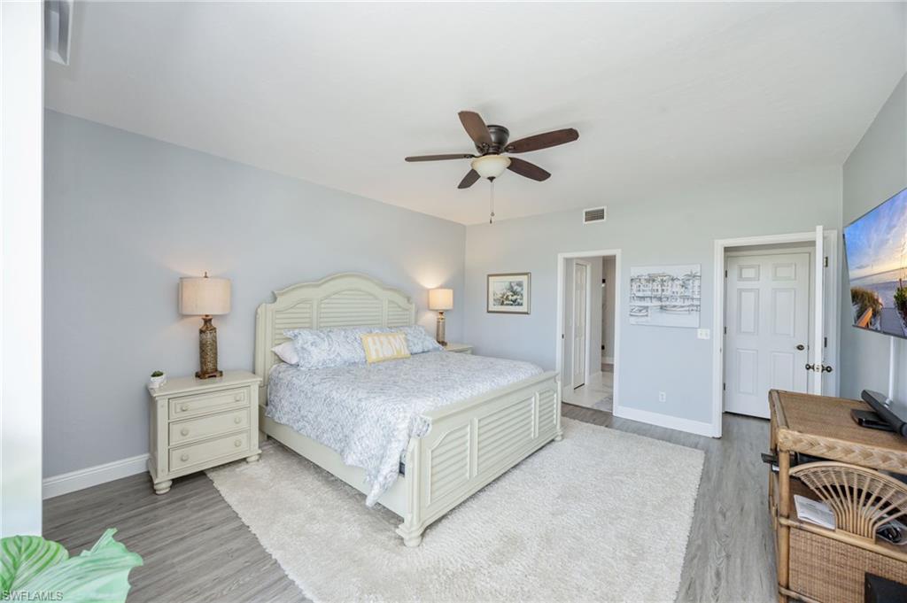 Bedroom featuring light wood-style flooring and a ceiling fan