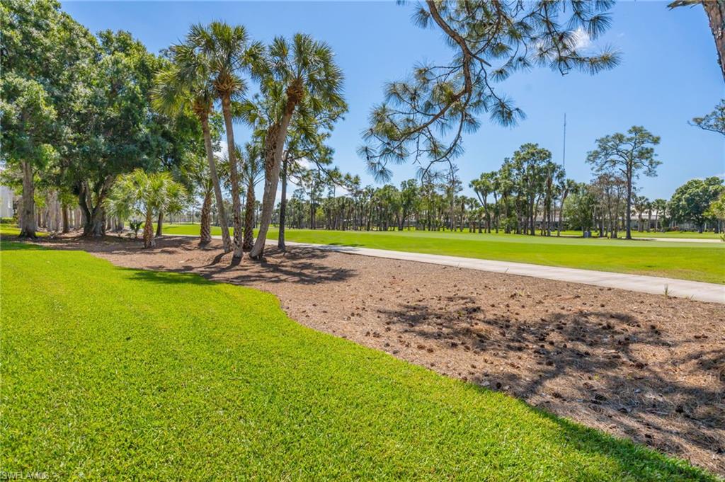 Surrounding community featuring view of golf course