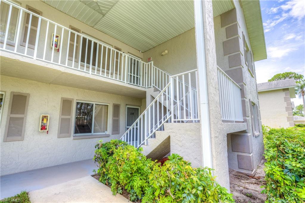 View of exterior entry featuring stucco siding