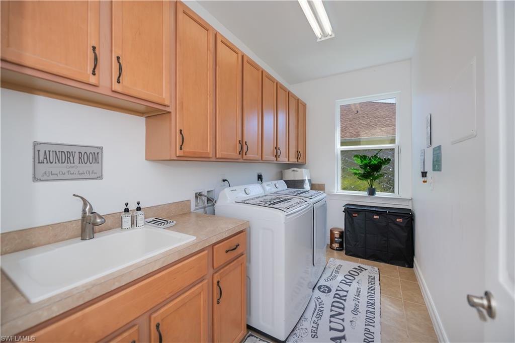 Massive Laundry room with plenty of storage