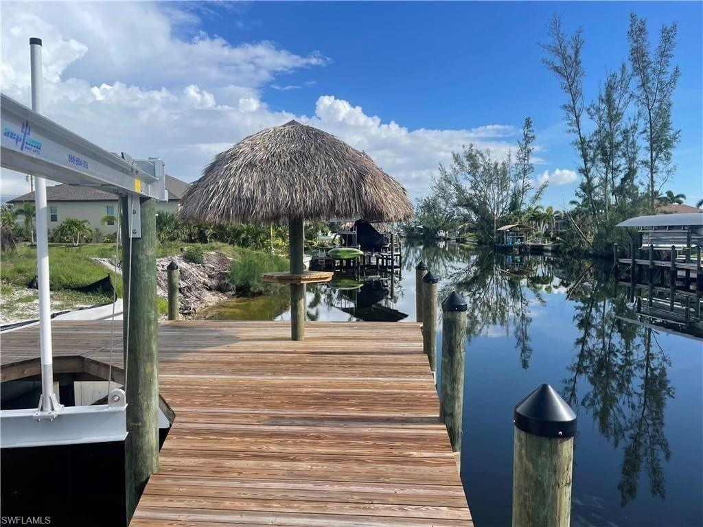 Dock featuring a water view