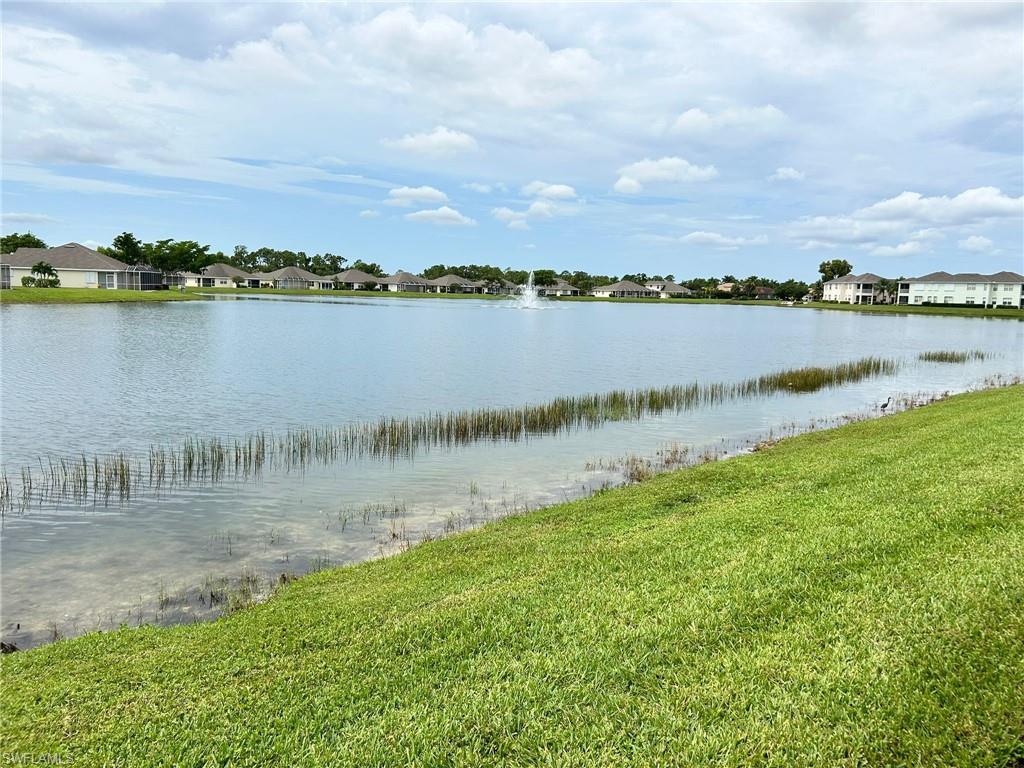 Water view with nearby suburban area