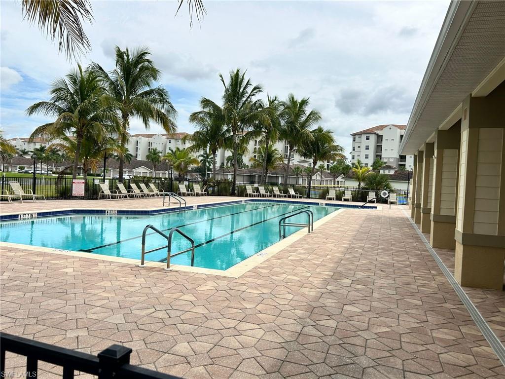 Community pool with a patio area