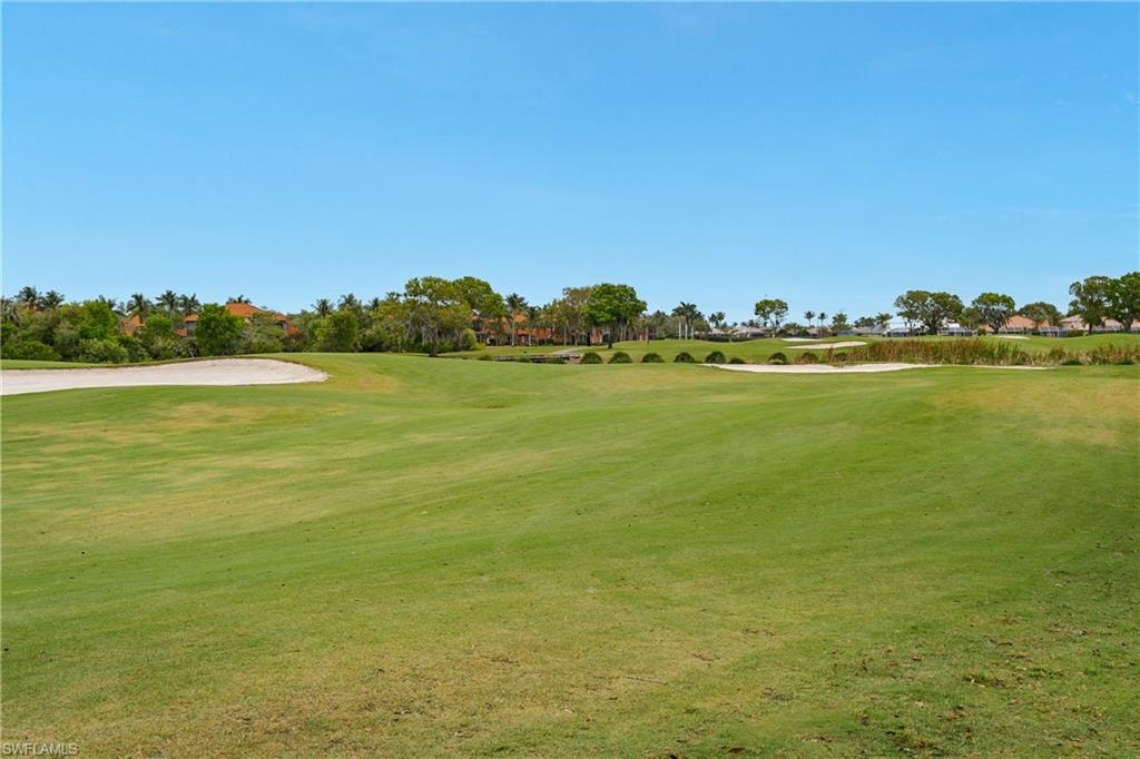 Surrounding community featuring view of golf course