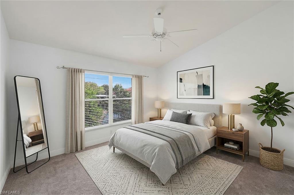 Virtually staged master bedroom suite.