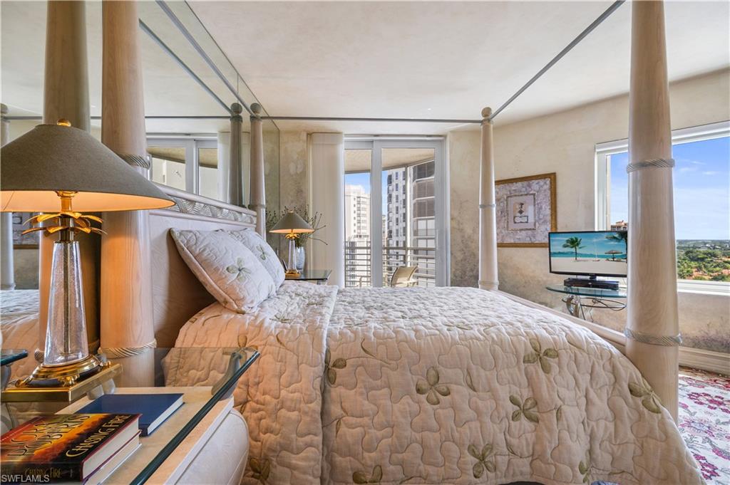 Bedroom featuring multiple windows