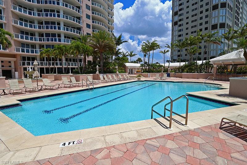 Community pool featuring a patio area and a gazebo