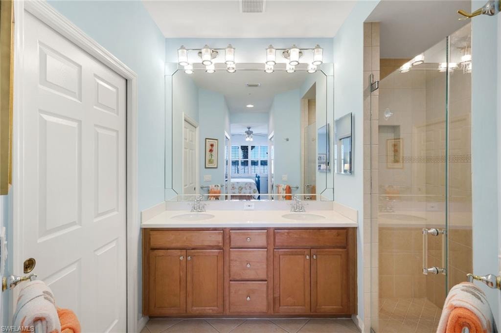Primary bathroom with private water closet and frameless glass enclosure!
