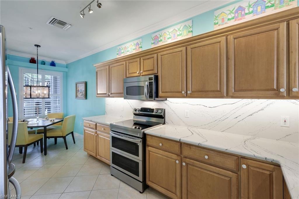 Under Counter Lighting and Double Oven with Air Fryer Combination.