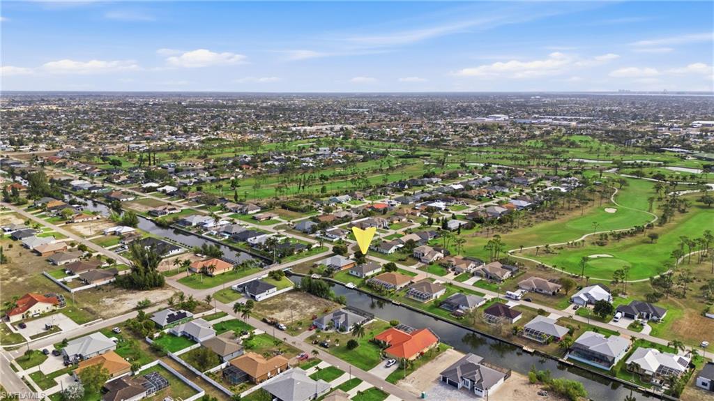 Aerial view of residential area with a nearby body of water