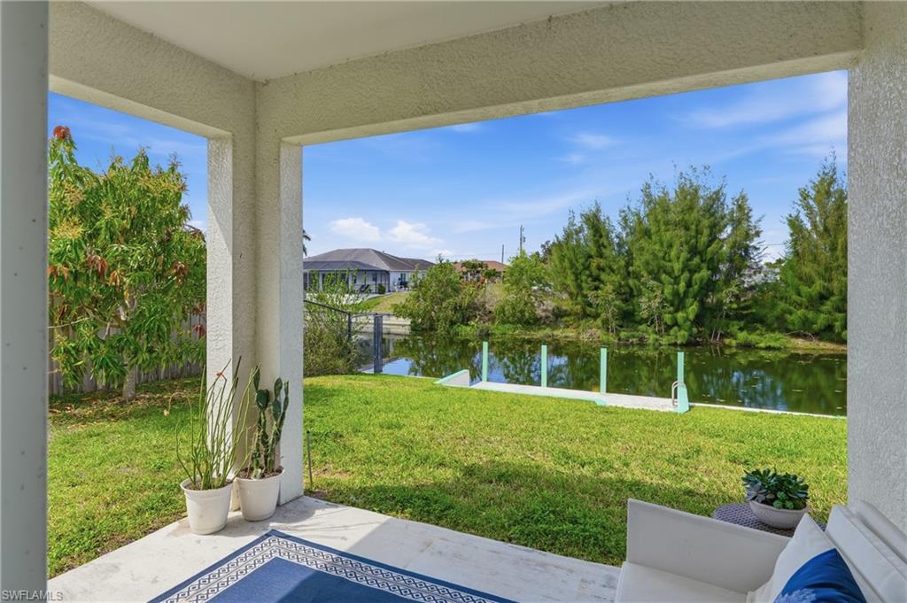 View of patio featuring a water view