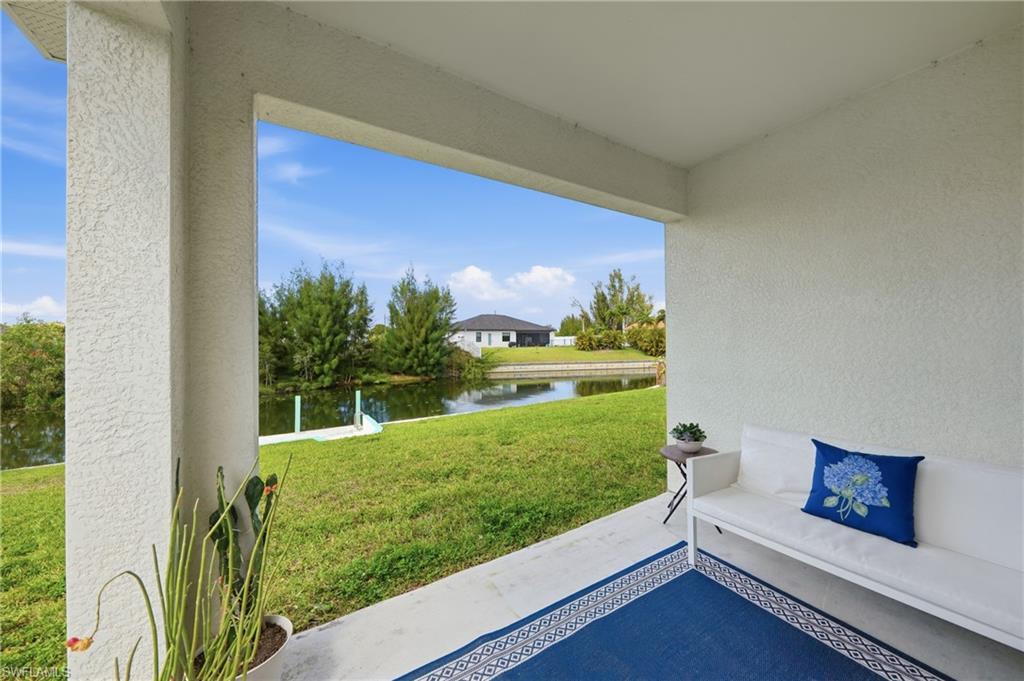 View of patio / terrace featuring a water view