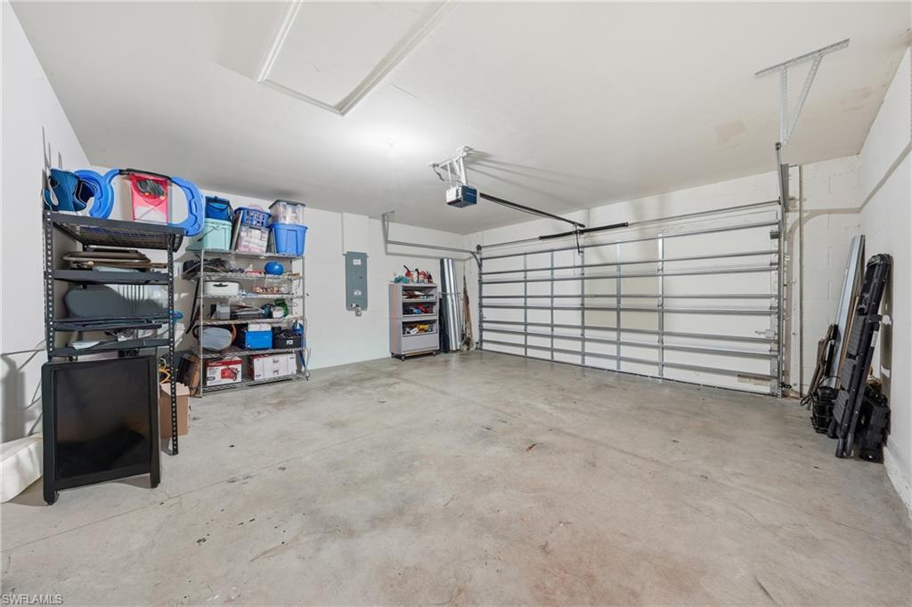 Garage featuring electric panel