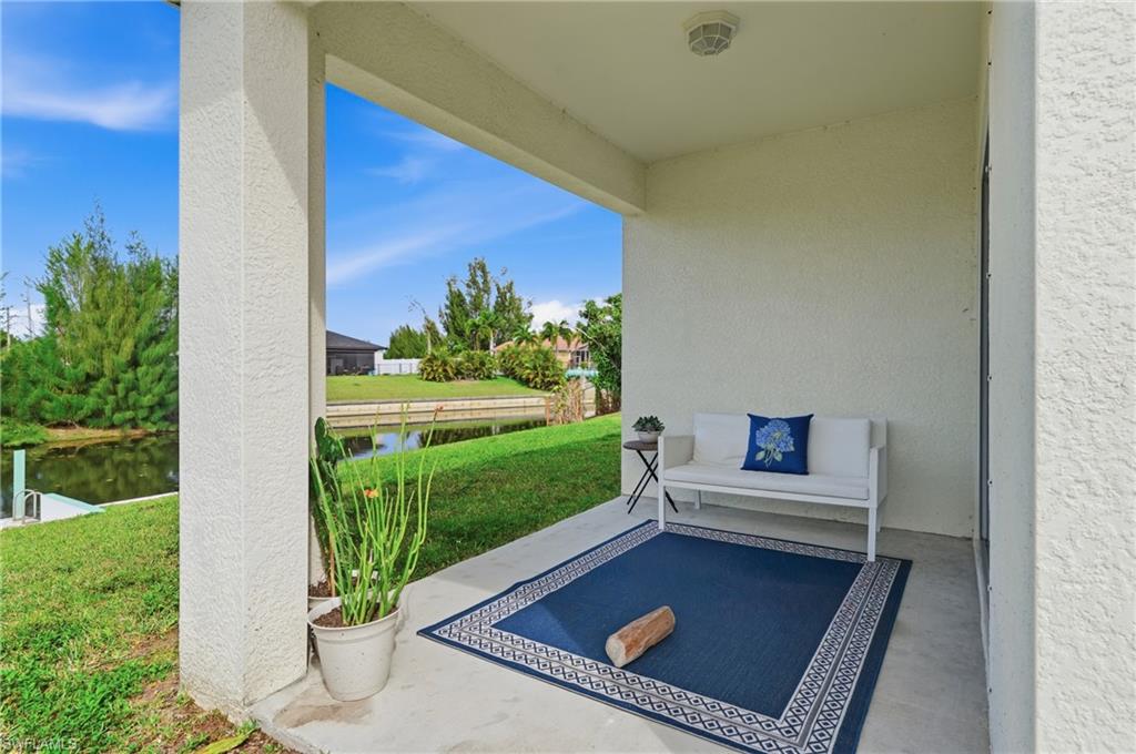 View of patio featuring a water view