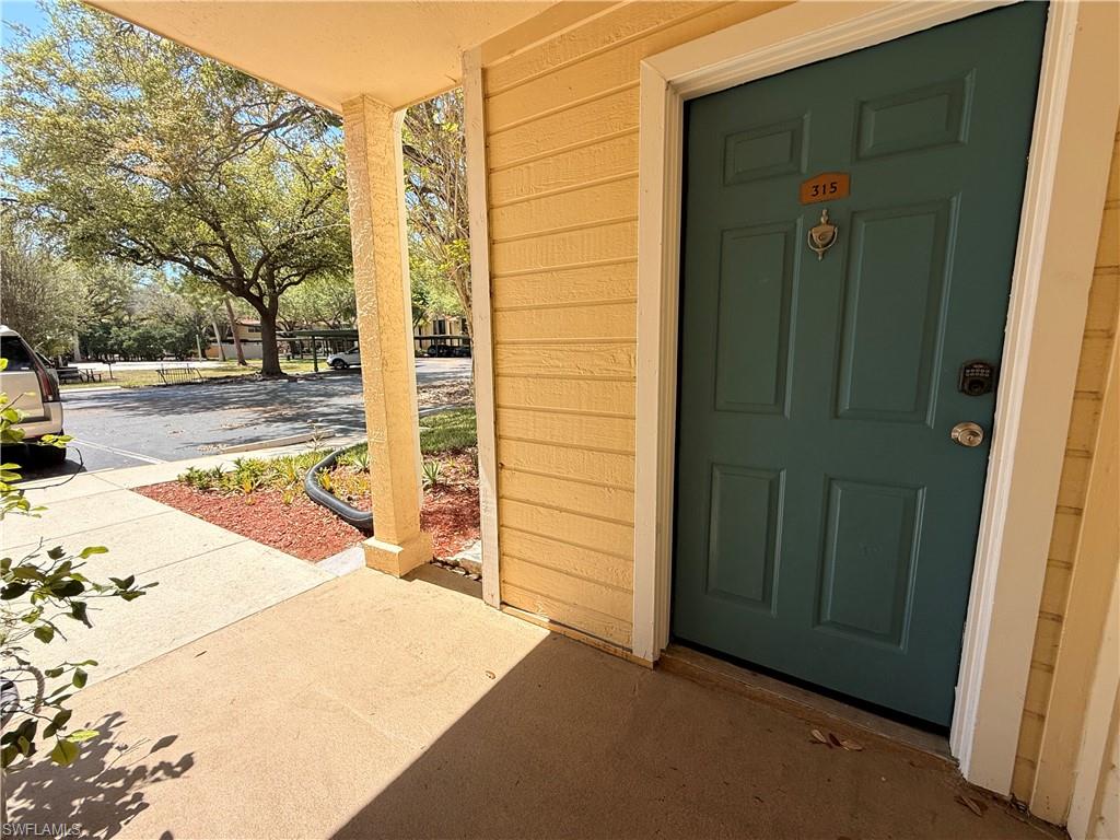 Property entrance featuring a porch