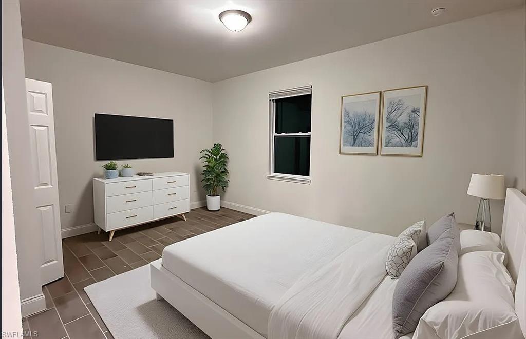 Bedroom with baseboards
