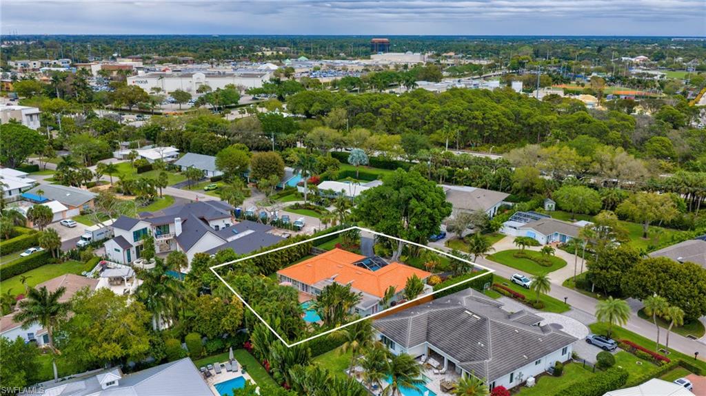 Aerial perspective of suburban area with property parcel outlined