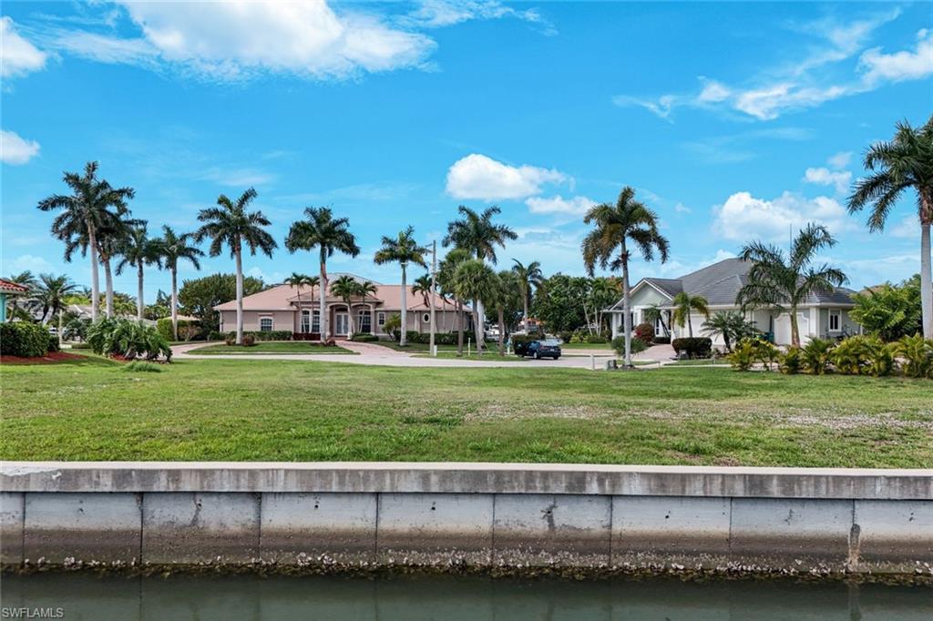 Surrounding community with a water view
