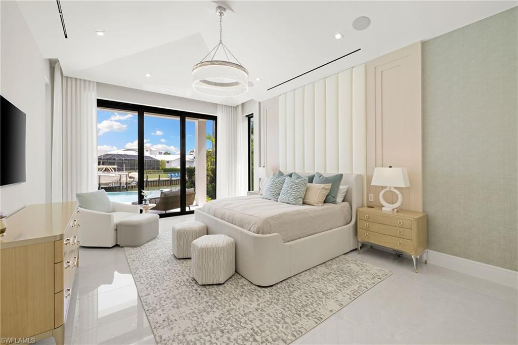 Bedroom with access to outside and recessed lighting