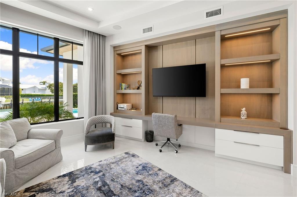 Office featuring built in study area and built in features