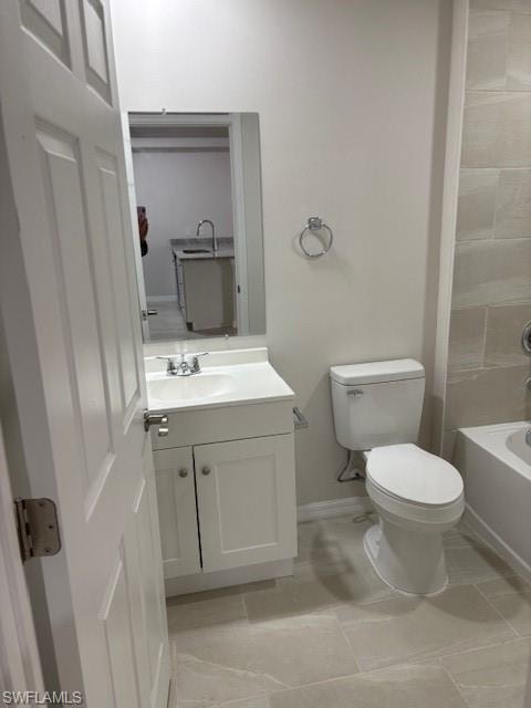Bathroom featuring vanity, light tile patterned floors, and shower / bath combination