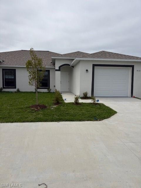 View of front of house featuring a front lawn, stucco siding, concrete driveway, a shingled roof, and a garage