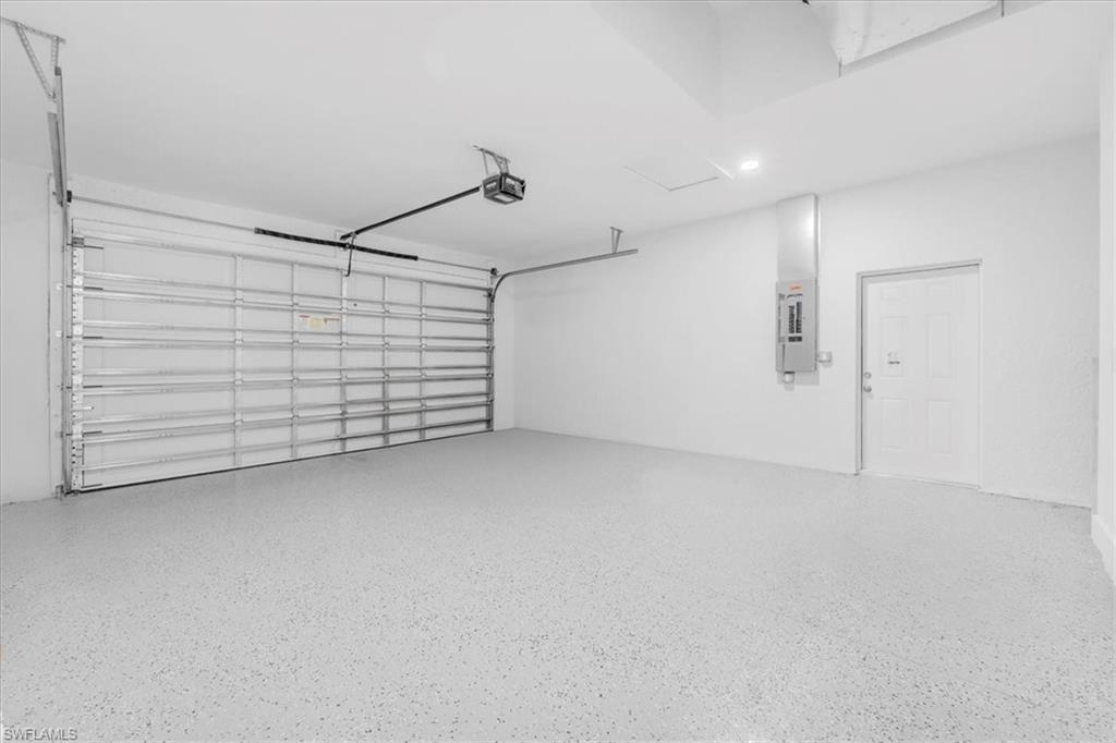 Garage featuring electric panel